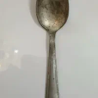 قاشق برنجی قدمت دار
