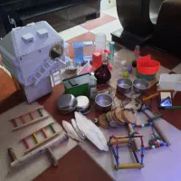 وسایل قفس پرنده و لامپ مادون قرمز