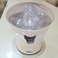 آب پرتقالگیر برقی