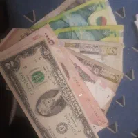 تعدادی پوله کاغذی ایرانی و خارجی کلکسیونی