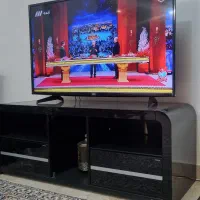 زیر تلویزیونی بسیار شیک و در حد نو و لوسترهای بزنز