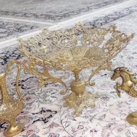 میوه خوری بزرگ‌برنز همراه وسایل دیگر