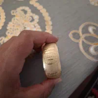طلا ۱۰۰تومان بالای تابلو