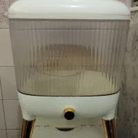 جای برنج به همراه پیمانه