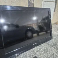 ایکس ویژن ۳۲ همراه با نگهدارنده به دیوار