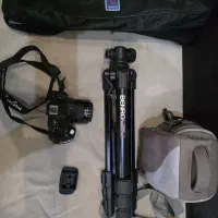 دوربین عکاسی canon sx50 به همراه پایه عکاسی