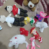 تعدادی عروسک|اسباببازی بچه|ایوان, |دیوار