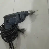 دریل اسکروگان