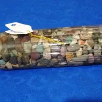 یک بطری پر از سنگهای معدنی و .‌آرام بخش ونوستالژیک