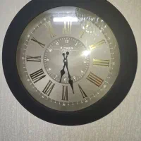 یک عدد ساعت دیواری چوبی موتور خارجی