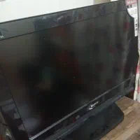 تلویزیون سونی با میز تلویزیون