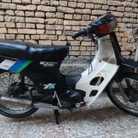 بیکلاج کاواساکی axm 100