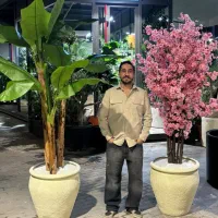 فروش گل های مصنوعی قم درختچه های دکوری گلدان چوبی