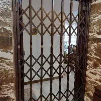 جاقفل.زددیلم حفاظ تراس اکاردیونی درب.محافظ.نردهomi