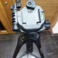 سه پایه دوربین و گوشی عکاسی|دوربین عکاسی و فیلمبرداری|تهران, فلسطین (میدان انقلاب)|دیوار