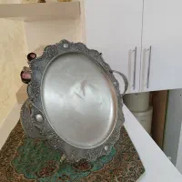 ساعت دو طرفه، سینی سیاه قلم، و عروسک