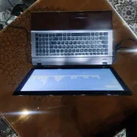 لپتاپ i5 ایسوس با بدنه طرح چوب