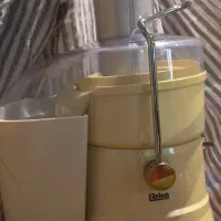 آب میوه گیری برینا