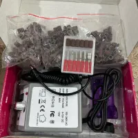 دستگاه کاشت ناخن