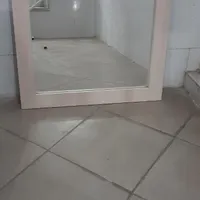 آینه همراه قاب