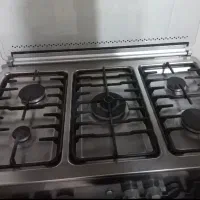 اجاق گاز فردار مدل سینجر گاز تمام استیل در حد نو