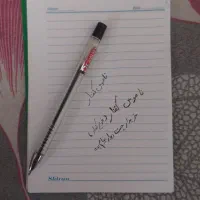 خودکار و دفترچه