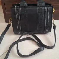 کیف|کیف، کفش، کمربند|بابل, |دیوار
