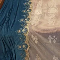 پرده تور مدل کتیبه با دستک آبی و زیر پرده ای.