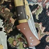 دنده ای قدیمی با یک کارد یو اس ا