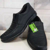 کفش برمودا|کیف، کفش، کمربند|اصفهان, شاهد|دیوار