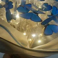 دسته گل ربانی و دسته گل پروانه ای با ریسه