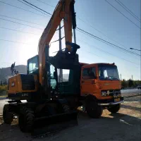 مینی بیل وخاور کمپرسی آماده کار درتمام نقاط