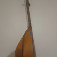 ساز قوپوز خوش دست|سازهای سنتی|میانه, |دیوار