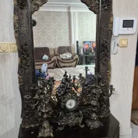 آیینه ،کنسول ،شمعدان و ساعت رومیزی