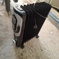 بخاری برقی روغنی|بخاری، هیتر، شومینه|قم, هفت تیر|دیوار