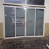 اجرای کرکره برقی شیشه سکوریت درب اتومات