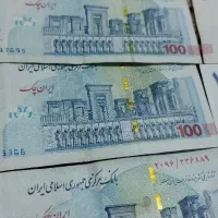۱۰۰تومانی امضا قرمز
