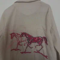 چند عدد مانتو دخترانه