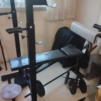 دستگاه بدنسازی همراه با سیم کش و هالتر و دمبل