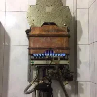 تعمیر سرویس ابگرمکن دیواری بوتان   تعمیر اجاق گاز