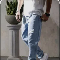 قیچی زن و راسته دوز در تولیدی شلوار جین