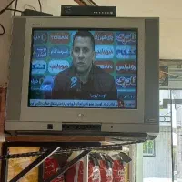 تلوزیون به همراه دستگاه دیجیتال