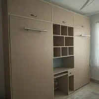 تخت خواب تاشو، میز کامپیوتر و قفسه کتاب