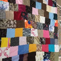 چهل تیکه با پارچه نو ملافه گرفته