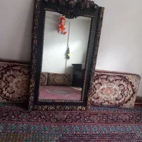 ساعت ایستاده و آینه