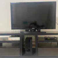 میز تلویزیون چوبی قهوه ای پشت دار