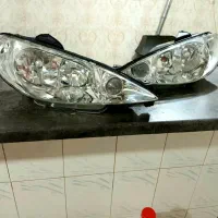 یک جفت چراغ جلو۲۰۶سالم و شفاف