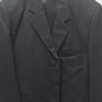 یک دست کت و شلوار مردانه