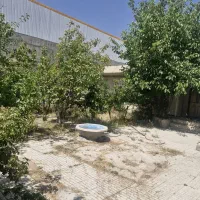 زمین خالی برای ساخت مغازه وکارگاه به همراه یک خانه