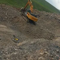راننده بیل مکانیکی